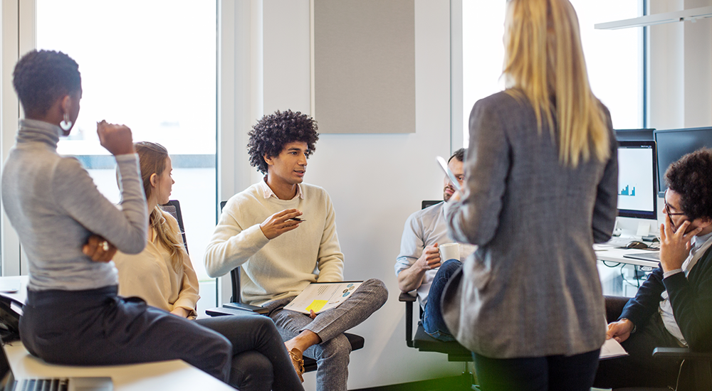 Young man leading a new business meeting